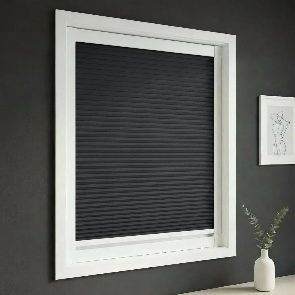 FAIZ blackout cellular blind in Navy Blue fabric with White rail, shown for modern-bedroom blackout performance.