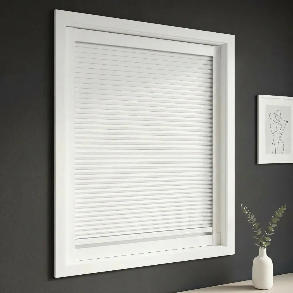 FAIZ blackout cellular blind in Pure White fabric with White rail, shown to support better sleep quality with complete light blocking.