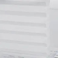 Pure white light-filtering cellular fabric for soft daytime comfort